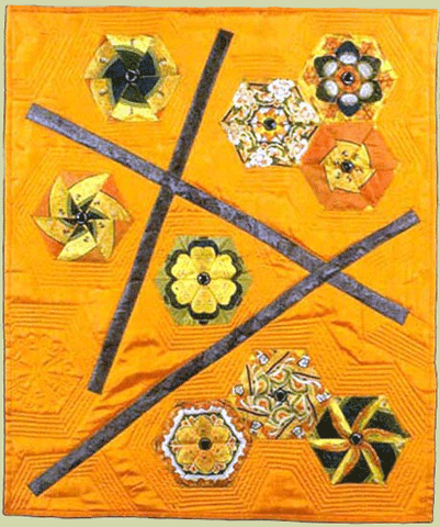 image of the quilt titled "Prayers for Compasion" © 2001 by Giselle Blythe